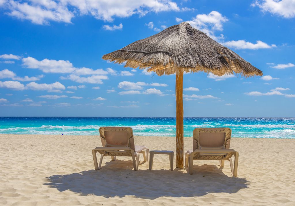 Beach chairs and umbrella